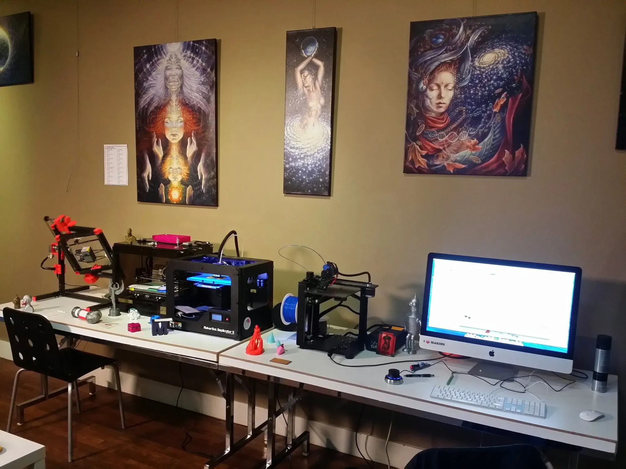 Jon's Magic Maker 3D printing studio, with printers and computers